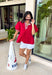 This red babydoll top is the perfect blend of playful and polished for the fall season! The rich red color makes a statement, while the crisp white contrast trim along the collar, front, and sleeves adds a classic touch that never goes out of style. Puff sleeves and the relaxed babydoll silhouette create an easy, flattering fit you'll love for busy days and weekend plans alike. Made from breathable cotton, it's comfortable enough for all-day wear and easy to layer under a denim jacket.