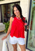 This red sleeveless top is the versatile staple your wardrobe needs all year long! The vibrant color makes it a standout choice for game day season, while the clean, classic silhouette ensures you'll wear it far beyond football weekends. Designed with a high round neckline and a simple keyhole button closure in the back, it has an elevated look that's easy to dress up or down.