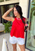 This red sleeveless top is the versatile staple your wardrobe needs all year long! The vibrant color makes it a standout choice for game day season, while the clean, classic silhouette ensures you'll wear it far beyond football weekends. Designed with a high round neckline and a simple keyhole button closure in the back, it has an elevated look that's easy to dress up or down.