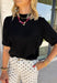 A timeless black sweater is a must-have for every fall wardrobe! This short sleeve mock neck sweater is the perfect blend of cozy comfort and effortless style. Crafted from an ultra-soft knit with a touch of wool, it's warm enough for crisp autumn mornings while remaining lightweight enough for easy layering. The mock neckline gives it a polished, elevated feel, making it just as perfect for the office as it is for weekend outings or dinner with friends. 