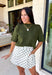 Every fall wardrobe needs a sweater like this! Soft, cozy, and endlessly versatile, this olive mock neck short sleeve sweater is the perfect layering piece for the season. The lightweight knit makes it comfortable enough for warmer autumn afternoons while still providing the cozy feel you'll love as temperatures begin to cool. Finished with a classic mock neckline and ribbed detailing, this timeless sweater pairs effortlessly with everything from your favorite denim to tailored trousers.