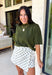 Every fall wardrobe needs a sweater like this! Soft, cozy, and endlessly versatile, this olive mock neck short sleeve sweater is the perfect layering piece for the season. The lightweight knit makes it comfortable enough for warmer autumn afternoons while still providing the cozy feel you'll love as temperatures begin to cool. Finished with a classic mock neckline and ribbed detailing, this timeless sweater pairs effortlessly with everything from your favorite denim to tailored trousers.