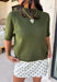 Every fall wardrobe needs a sweater like this! Soft, cozy, and endlessly versatile, this olive mock neck short sleeve sweater is the perfect layering piece for the season. The lightweight knit makes it comfortable enough for warmer autumn afternoons while still providing the cozy feel you'll love as temperatures begin to cool. Finished with a classic mock neckline and ribbed detailing, this timeless sweater pairs effortlessly with everything from your favorite denim to tailored trousers.