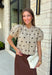 A classic print meets an effortlessly feminine silhouette in this charming knit cardigan! Featuring a soft tan knit with a playful brown polka dot print, this button-down cardigan is finished with sweet puff sleeves for an elevated touch. Whether worn buttoned as a top or layered over your favorite basics, this versatile piece is perfect for everything from office days to coffee dates and weekend outings.
