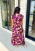 Timeless florals meet effortless comfort in this beautiful midi dress that's ready for every occasion on your fall calendar! Designed in a rich brown hue with a stunning pink and purple floral print, this cotton dress is both feminine and easy to wear. The collared v-neckline and button-front closure create a polished look, while the flowy midi silhouette and cap sleeves keep it comfortable from morning to night. 