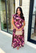 Timeless florals meet effortless comfort in this beautiful midi dress that's ready for every occasion on your fall calendar! Designed in a rich brown hue with a stunning pink and purple floral print, this cotton dress is both feminine and easy to wear. The collared v-neckline and button-front closure create a polished look, while the flowy midi silhouette and cap sleeves keep it comfortable from morning to night. 