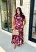 Timeless florals meet effortless comfort in this beautiful midi dress that's ready for every occasion on your fall calendar! Designed in a rich brown hue with a stunning pink and purple floral print, this cotton dress is both feminine and easy to wear. The collared v-neckline and button-front closure create a polished look, while the flowy midi silhouette and cap sleeves keep it comfortable from morning to night. 