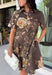 Celebrate the beauty of the season in this effortlessly timeless dress from Entro. Designed in a rich deep olive hue, this button-down dress features a beautiful mix of tan and black stripes paired with a fall-inspired floral print in shades of tan, olive, rust, and brown. The classic button-front silhouette creates an effortlessly polished look, while the fully lined design and convenient side pockets make it as practical as it is beautiful. 