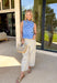 A fresh twist on your favorite relaxed denim! These neutral barrel jeans feature the sweetest dainty blue floral print throughout, giving them a soft, feminine feel while still keeping that laid-back, on-trend silhouette. The barrel leg shape creates a modern, slightly tapered look that feels both comfortable and stylish. An elastic back waistband adds a touch of stretch for an easy fit, while the cotton denim keeps them structured and breathable. They’re the perfect mix of playful and effortless.