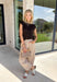 The perfect layering piece for fall has arrived! This chocolate brown sleeveless button-down cardigan is a timeless staple you'll reach for again and again. Crafted from a soft, lightweight knit, it's cozy without feeling bulky, making it perfect for layering over dresses, fitted tees, or long sleeve tops as the weather cools. Whether you wear it buttoned as a sweater vest or open for a relaxed layered look, this versatile knit is an effortless addition to your autumn wardrobe.