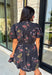 Embrace the beauty of the season in this effortlessly feminine floral dress that's made for all your favorite fall occasions. Designed with a classic black backdrop and adorned with a rich floral print in gorgeous autumn-inspired hues, this dress is the perfect combination of timeless elegance and everyday comfort. The ruffled v-neckline and puff sleeves add a romantic touch, while the self-tie waist creates a flattering silhouette you'll love. 
