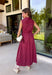 Bring effortless charm to your fall wardrobe with this beautifully detailed midi dress from Entro. Featuring rich plum and rust stripes, this timeless dress combines classic style with feminine touches you'll love. The collared neckline and button-front design create a polished silhouette, while the self-tie detail at the front adds a flattering, playful finish. 
