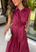 Bring effortless charm to your fall wardrobe with this beautifully detailed midi dress from Entro. Featuring rich plum and rust stripes, this timeless dress combines classic style with feminine touches you'll love. The collared neckline and button-front design create a polished silhouette, while the self-tie detail at the front adds a flattering, playful finish. 