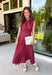 Bring effortless charm to your fall wardrobe with this beautifully detailed midi dress from Entro. Featuring rich plum and rust stripes, this timeless dress combines classic style with feminine touches you'll love. The collared neckline and button-front design create a polished silhouette, while the self-tie detail at the front adds a flattering, playful finish. 