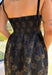 When the invite calls for dressy but you still want to feel comfortable, this is the dress. In classic black with a subtle gold floral texture that feels lace-like, it’s a showstopper without being over the top. The scalloped neckline and hem add a romantic finish, while the self-tie straps let you adjust for the perfect fit. Whether you’re attending a wedding, holiday party, or a candlelit dinner, this midi is a timeless choice you’ll wear for seasons to come.
