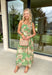 Elegant, feminine, and perfect for special moments! This green sleeveless midi dress features a bold neutral floral print that feels both eye-catching and timeless. The square neckline adds a flattering, structured touch while keeping the look soft and romantic. Designed with adjustable straps and a smocked back, this dress offers a comfortable fit that still shapes beautifully. The fully lined fabric drapes effortlessly, making it ideal for weddings, showers, dinner parties, or any occasion.