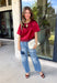A rich red satin gives this short sleeve top from Sunday Edition the perfect festive feel for the holiday season. The smooth fabric adds a pretty touch of shine, while the lace hem brings in a soft detail that dresses up the simple silhouette. A keyhole opening at the back adds a finishing touch without taking away from the easy-to-style design. It’s a fun option for everything from Christmas parties and holiday dinners to festive date nights and seasonal get-togethers. 