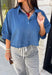 A classic denim top is a staple you'll reach for season after season! Crafted from soft medium wash denim, this effortless button-down blouse is designed with relaxed dolman sleeves and a subtle high-low hem for an easy, flattering fit. The collared neckline adds a timeless touch, making it simple to dress up or keep casual. Whether you're layering it under a blazer or wearing it on its own with your favorite fall denim, this versatile piece belongs in every autumn wardrobe.