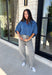 Everyone’s favorite barrel jean is back in a fun new print! These high waisted gray leopard print jeans are the perfect way to add a little personality to your everyday wardrobe while still keeping things neutral and easy to style. The barrel leg silhouette gives them that trendy, relaxed look everyone loves, while the drawstring detail adds an extra touch of comfort and casual charm. The gray-toned leopard print feels fresh and versatile, making these jeans easy to pair with everything.