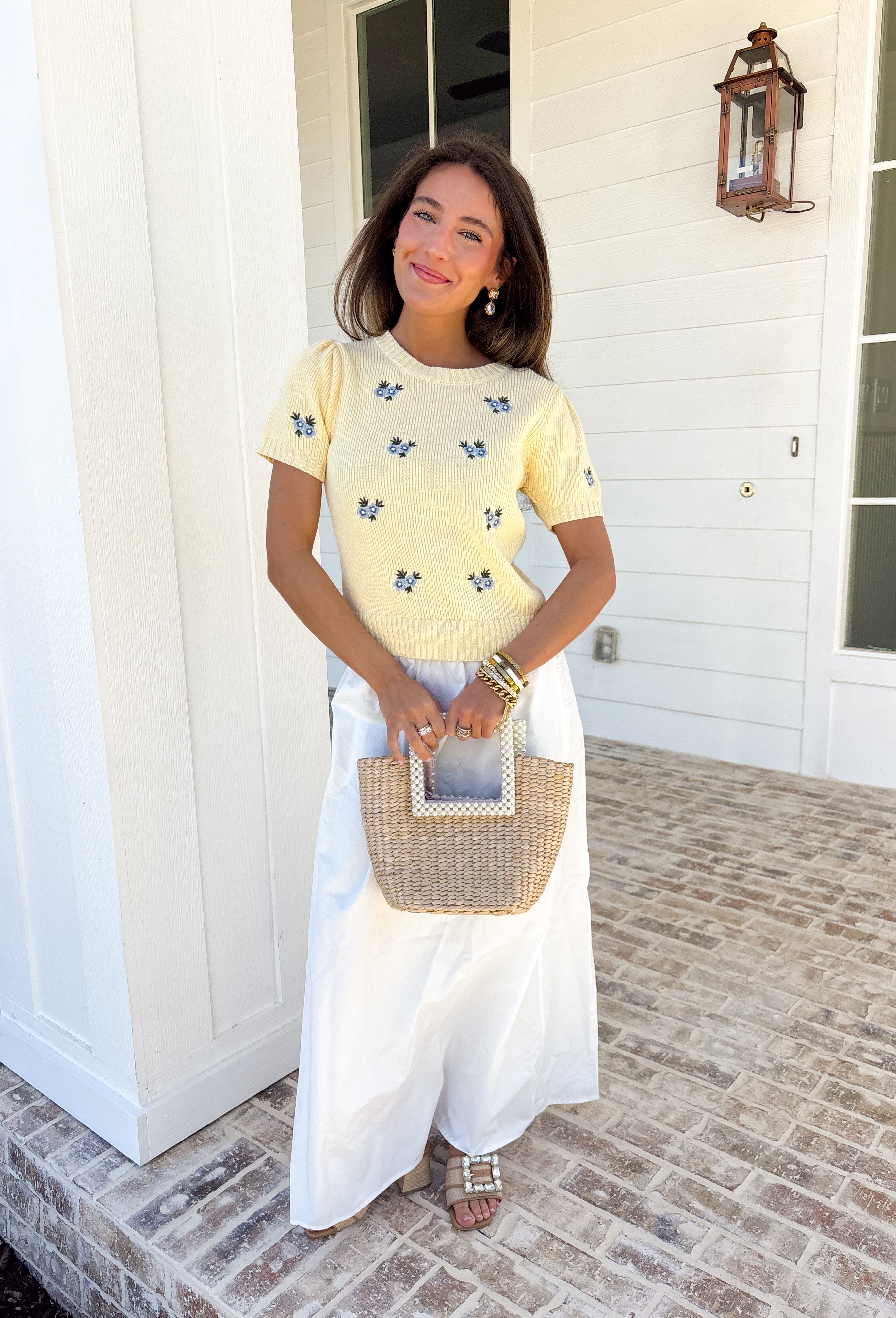 Soft, cheerful, and made for sunny days! This butter yellow ribbed sweater features the prettiest blue embroidered floral print that adds a fresh pop of color to your everyday look. The ribbed texture gives it a flattering, easy fit while the delicate embroidery brings in that sweet, spring-ready feel.Lightweight and comfortable, this short sleeve sweater is perfect for transitioning between seasons. 