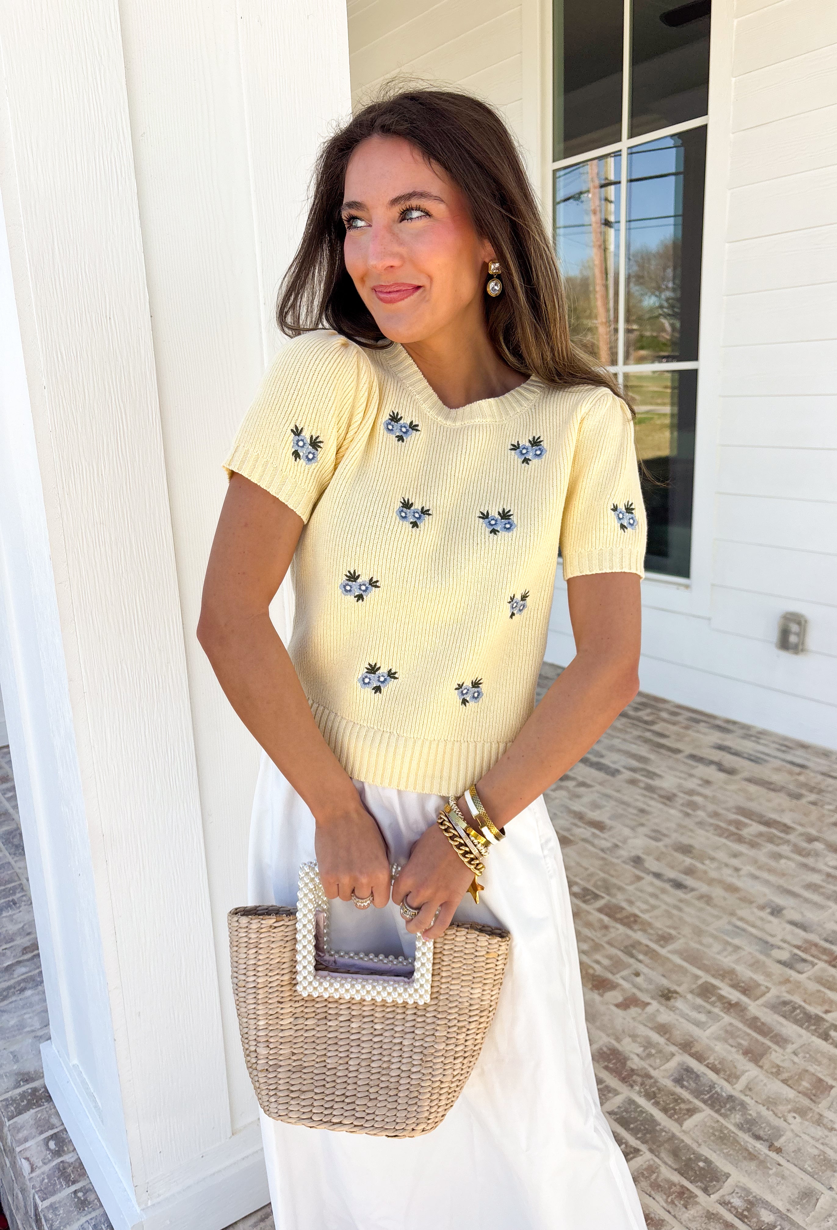 Soft, cheerful, and made for sunny days! This butter yellow ribbed sweater features the prettiest blue embroidered floral print that adds a fresh pop of color to your everyday look. The ribbed texture gives it a flattering, easy fit while the delicate embroidery brings in that sweet, spring-ready feel.Lightweight and comfortable, this short sleeve sweater is perfect for transitioning between seasons. 