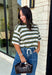 Wrap yourself in effortless comfort with a sweater that's made for all your favorite fall moments! This cozy ribbed knit blends soft off white, light blue, and olive tones into a timeless color palette that's easy to style throughout the season. The lightweight feel makes it perfect for layering without adding bulk, while the 3/4-length sleeves offer just the right amount of coverage for crisp mornings and sunny autumn afternoons. 