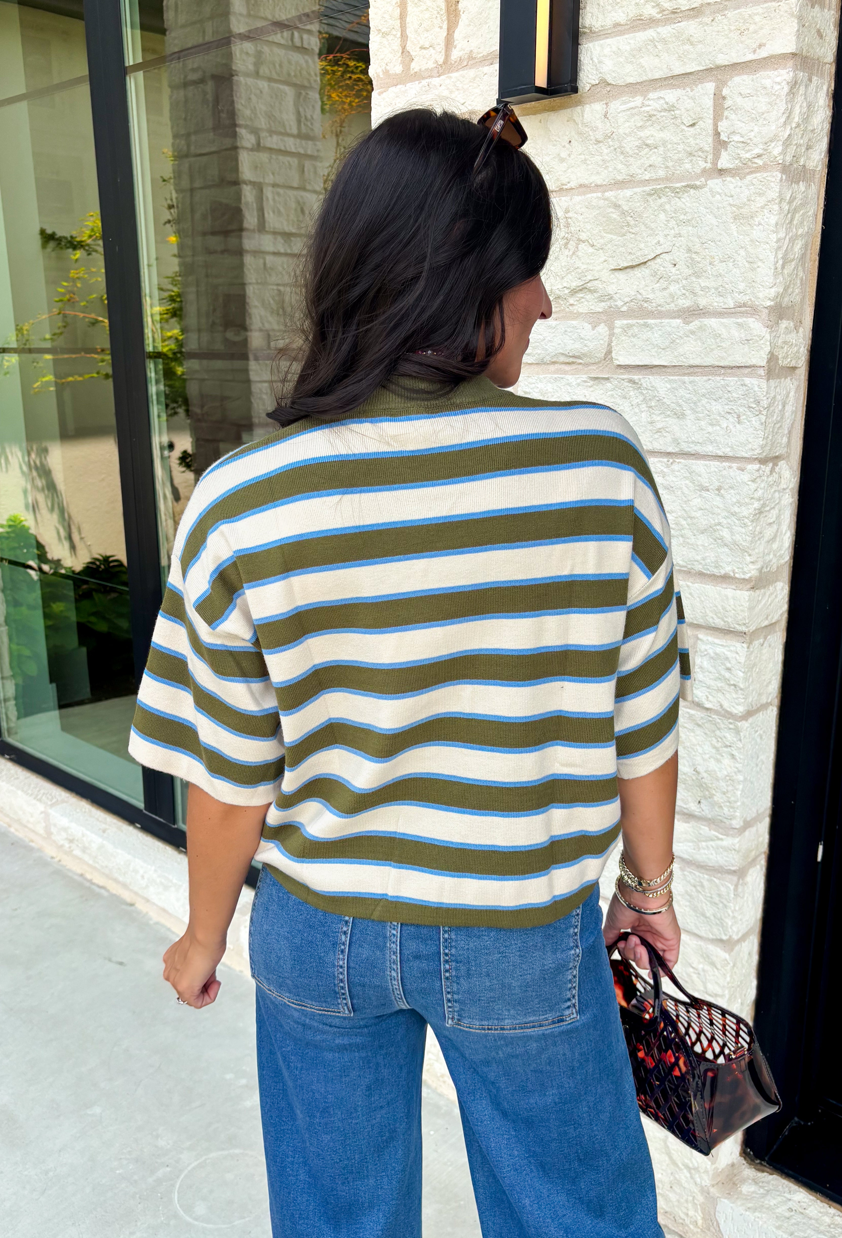 Wrap yourself in effortless comfort with a sweater that's made for all your favorite fall moments! This cozy ribbed knit blends soft off white, light blue, and olive tones into a timeless color palette that's easy to style throughout the season. The lightweight feel makes it perfect for layering without adding bulk, while the 3/4-length sleeves offer just the right amount of coverage for crisp mornings and sunny autumn afternoons. 