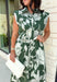 Fresh florals and timeless details come together in this effortlessly beautiful midi dress that's ready for every occasion on your calendar! Designed in a rich fern green with a neutral floral print, this cotton dress brings an easy elegance to your everyday wardrobe. The button-front bodice, self-tie waist belt, and flowy midi silhouette create a flattering fit you'll love, while the side pockets and fully lined design make it as practical as it is pretty. 