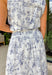 Crisp white and navy is always a yes! This matching midi skirt features a timeless navy floral print throughout for a fresh, polished look that’s perfect for sunny days. The flowy silhouette gives it beautiful movement, while the elastic waistband keeps it comfortable and easy to wear all day long. Lightweight in 100% cotton and effortlessly versatile, this skirt is perfect for everything from weekend brunch to vacation strolls. 