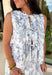 Crisp white and navy is always a yes! This sleeveless top features a timeless navy floral print throughout for a fresh, polished look that’s perfect for warm days. The three tie details along the top add a playful, feminine touch, while the soft pleating along the front gives it beautiful shape and movement. Lightweight in 100% cotton and easy to style, this top is perfect for everything from weekend brunch to vacation dinners.