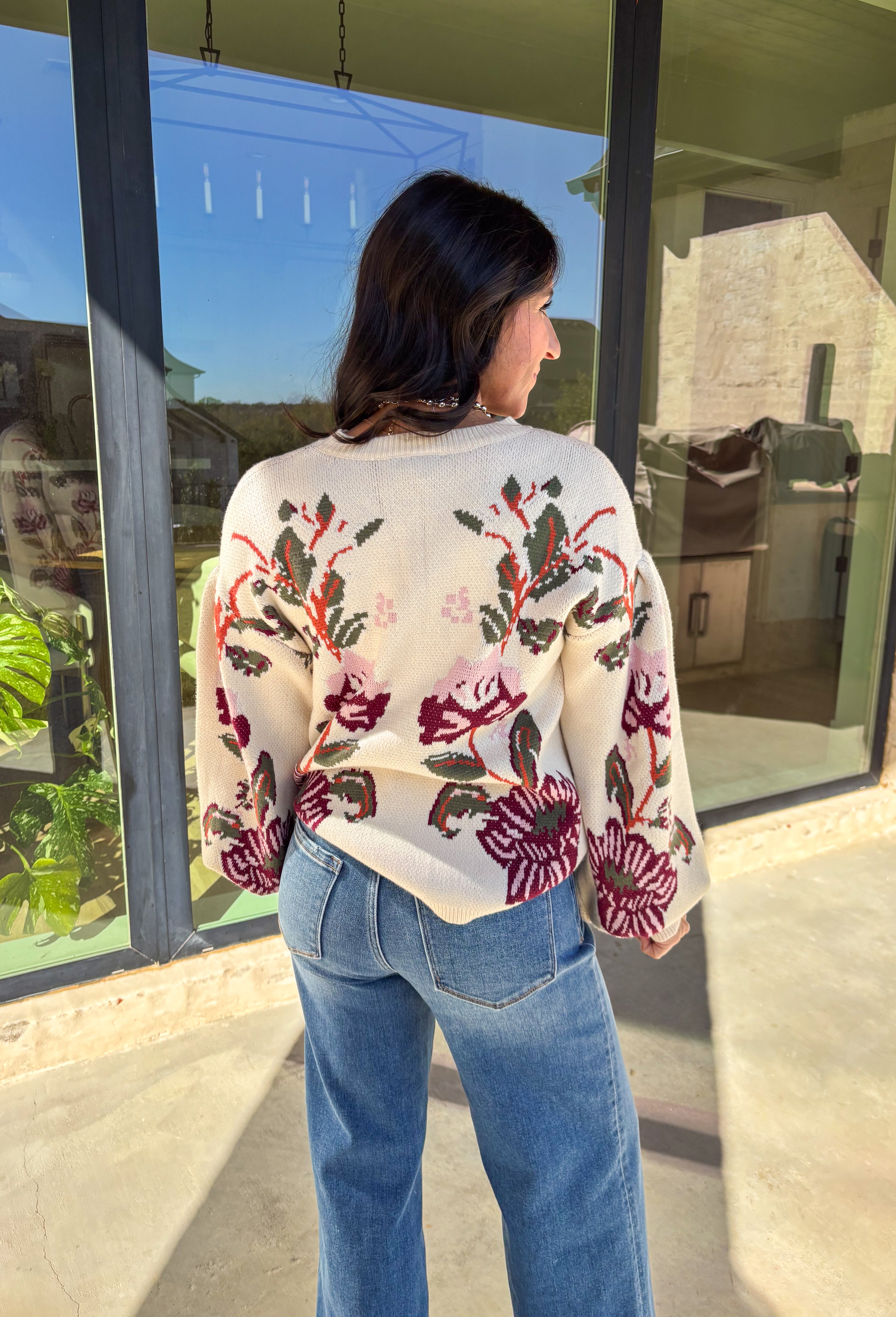 Bring a touch of warmth and charm to your winter wardrobe with this floral knit sweater by Voy. Designed in a soft cream base with blooms of hunter green, rust, burgundy, and light pink, this cozy knit perfectly captures the beauty of the season. The balloon sleeves add a stylish, relaxed shape, making it a perfect choice for everything from casual days to cozy evenings by the fire.