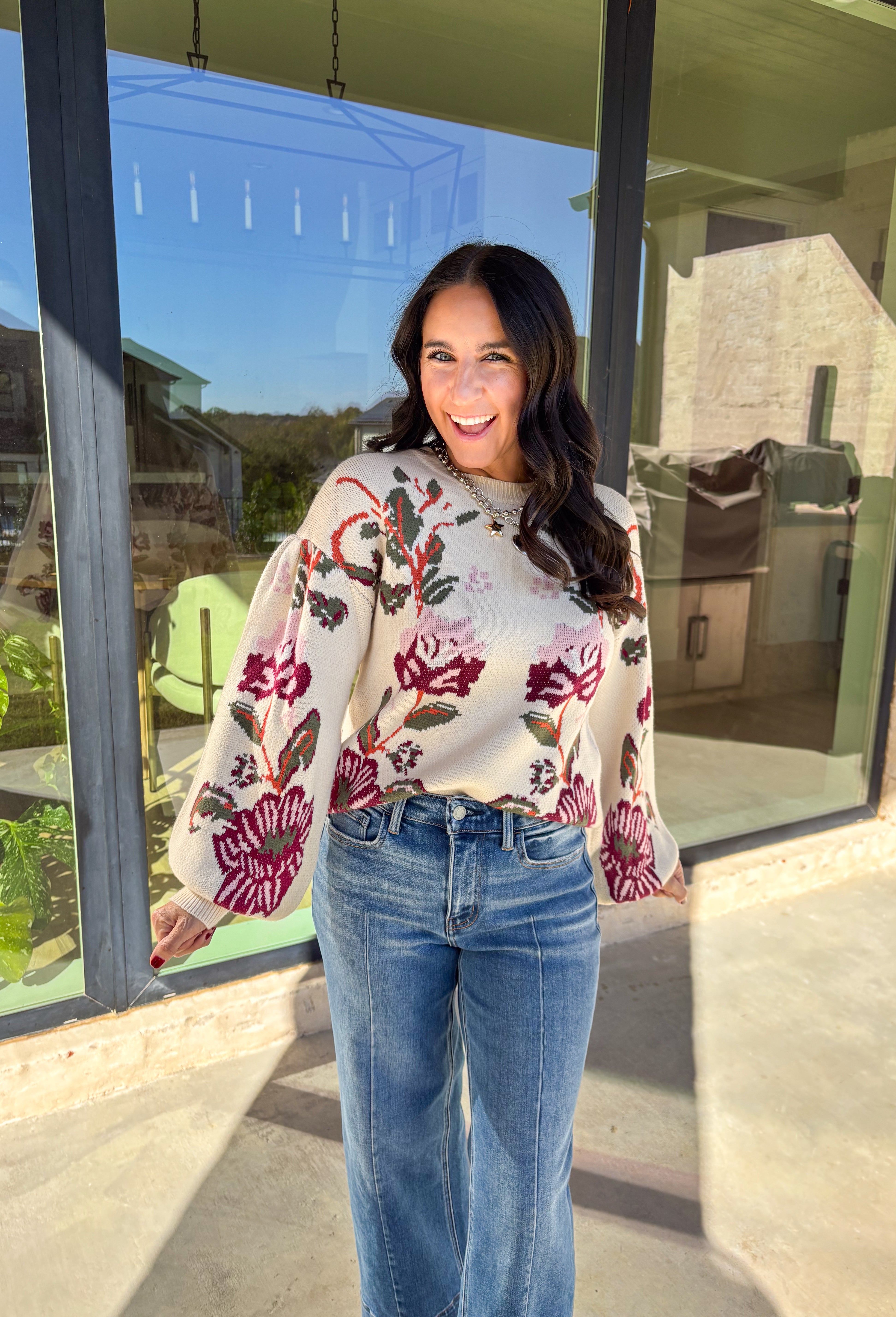 Bring a touch of warmth and charm to your winter wardrobe with this floral knit sweater by Voy. Designed in a soft cream base with blooms of hunter green, rust, burgundy, and light pink, this cozy knit perfectly captures the beauty of the season. The balloon sleeves add a stylish, relaxed shape, making it a perfect choice for everything from casual days to cozy evenings by the fire.