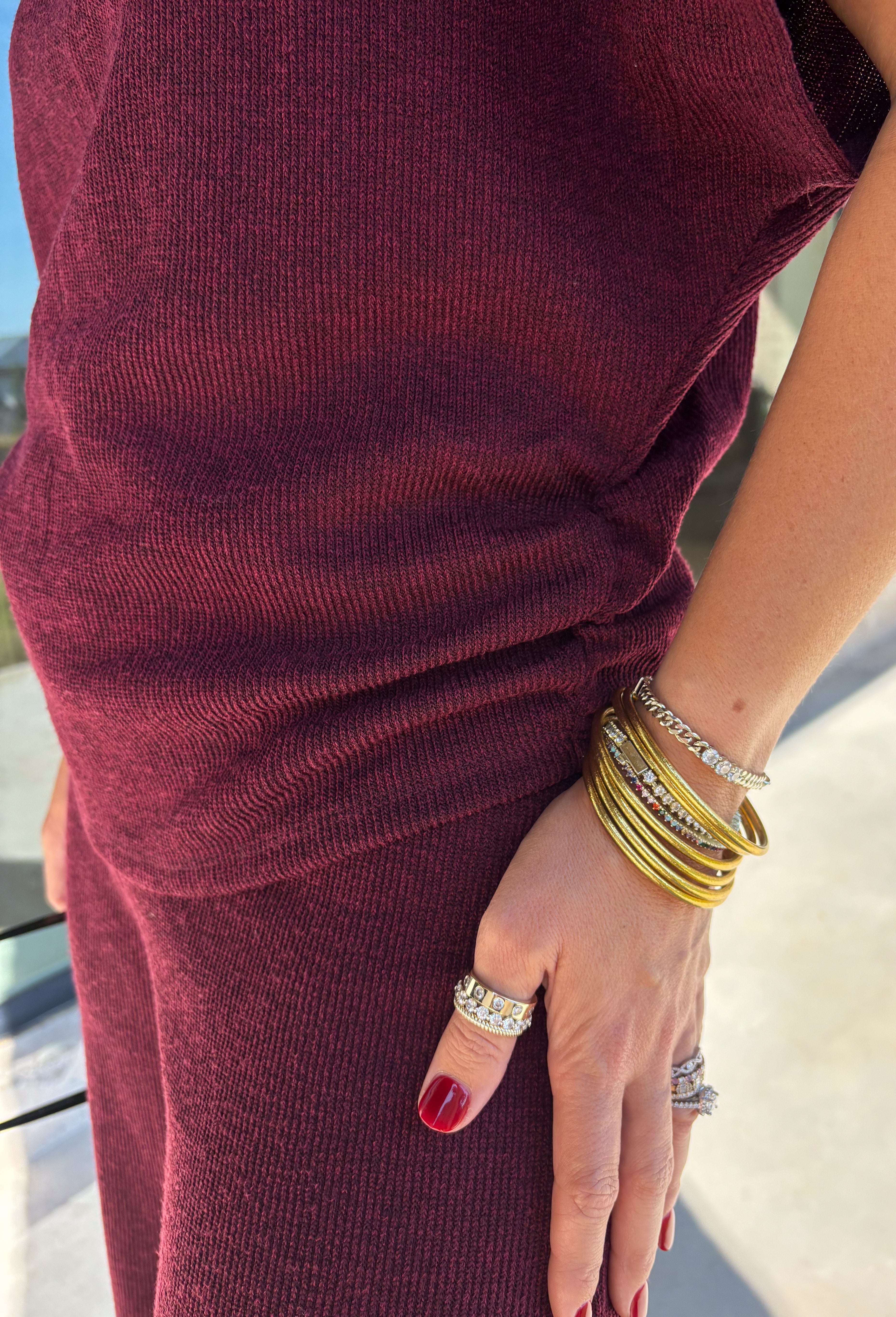 Rich burgundy makes this matching set from Hyfve an easy choice for the transition from fall gatherings into the holiday season. The short sleeve mock neck top features ruching along the sides, adding texture and shape to the simple silhouette. Matching wide leg pants keep the look comfortable with an easy elastic waistband and plenty of movement.