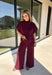 Rich burgundy makes this matching set from Hyfve an easy choice for the transition from fall gatherings into the holiday season. The short sleeve mock neck top features ruching along the sides, adding texture and shape to the simple silhouette. Matching wide leg pants keep the look comfortable with an easy elastic waistband and plenty of movement.