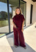 Rich burgundy makes this matching set from Hyfve an easy choice for the transition from fall gatherings into the holiday season. The short sleeve mock neck top features ruching along the sides, adding texture and shape to the simple silhouette. Matching wide leg pants keep the look comfortable with an easy elastic waistband and plenty of movement.