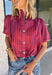 Rich autumn colors and feminine details make this striped blouse an effortless addition to your seasonal wardrobe. Featuring warm plum and rust stripes, this lightweight cotton top captures the beauty of fall while offering an easy, everyday silhouette you'll love. The banded neckline, puff sleeves, and button-front design create a polished look, while the shirring at the shoulders and back adds beautiful texture and a flattering drape. 