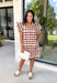 Bring playful charm to your fall wardrobe with this beautiful dress from THML. Designed in a rich burgundy hue with a bold neutral polka dot print, this timeless piece is perfect for everything from brunch dates to seasonal celebrations. The ruffle sleeves are finished with delicate smocking for an extra feminine touch, while the fully lined silhouette offers all-day comfort. Complete with convenient side pockets, this cotton dress is one you'll love reaching for throughout the season.