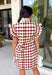 Bring playful charm to your fall wardrobe with this beautiful dress from THML. Designed in a rich burgundy hue with a bold neutral polka dot print, this timeless piece is perfect for everything from brunch dates to seasonal celebrations. The ruffle sleeves are finished with delicate smocking for an extra feminine touch, while the fully lined silhouette offers all-day comfort. Complete with convenient side pockets, this cotton dress is one you'll love reaching for throughout the season.