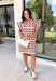 Bring playful charm to your fall wardrobe with this beautiful dress from THML. Designed in a rich burgundy hue with a bold neutral polka dot print, this timeless piece is perfect for everything from brunch dates to seasonal celebrations. The ruffle sleeves are finished with delicate smocking for an extra feminine touch, while the fully lined silhouette offers all-day comfort. Complete with convenient side pockets, this cotton dress is one you'll love reaching for throughout the season.