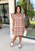 Bring playful charm to your fall wardrobe with this beautiful dress from THML. Designed in a rich burgundy hue with a bold neutral polka dot print, this timeless piece is perfect for everything from brunch dates to seasonal celebrations. The ruffle sleeves are finished with delicate smocking for an extra feminine touch, while the fully lined silhouette offers all-day comfort. Complete with convenient side pockets, this cotton dress is one you'll love reaching for throughout the season.
