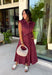 Meet the dress you'll be reaching for all fall long! This rich burgundy midi dress is effortlessly polished with its classic collared neckline, button front, and flattering self-tie waist that lets you create the perfect fit. Finished with side pockets and a fully lined design, it's as practical as it is stylish. From office days and brunch dates to family gatherings and fall festivities, this timeless dress is ready for every occasion.