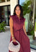 Meet the dress you'll be reaching for all fall long! This rich burgundy midi dress is effortlessly polished with its classic collared neckline, button front, and flattering self-tie waist that lets you create the perfect fit. Finished with side pockets and a fully lined design, it's as practical as it is stylish. From office days and brunch dates to family gatherings and fall festivities, this timeless dress is ready for every occasion.