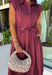 Meet the dress you'll be reaching for all fall long! This rich burgundy midi dress is effortlessly polished with its classic collared neckline, button front, and flattering self-tie waist that lets you create the perfect fit. Finished with side pockets and a fully lined design, it's as practical as it is stylish. From office days and brunch dates to family gatherings and fall festivities, this timeless dress is ready for every occasion.