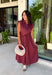Meet the dress you'll be reaching for all fall long! This rich burgundy midi dress is effortlessly polished with its classic collared neckline, button front, and flattering self-tie waist that lets you create the perfect fit. Finished with side pockets and a fully lined design, it's as practical as it is stylish. From office days and brunch dates to family gatherings and fall festivities, this timeless dress is ready for every occasion.