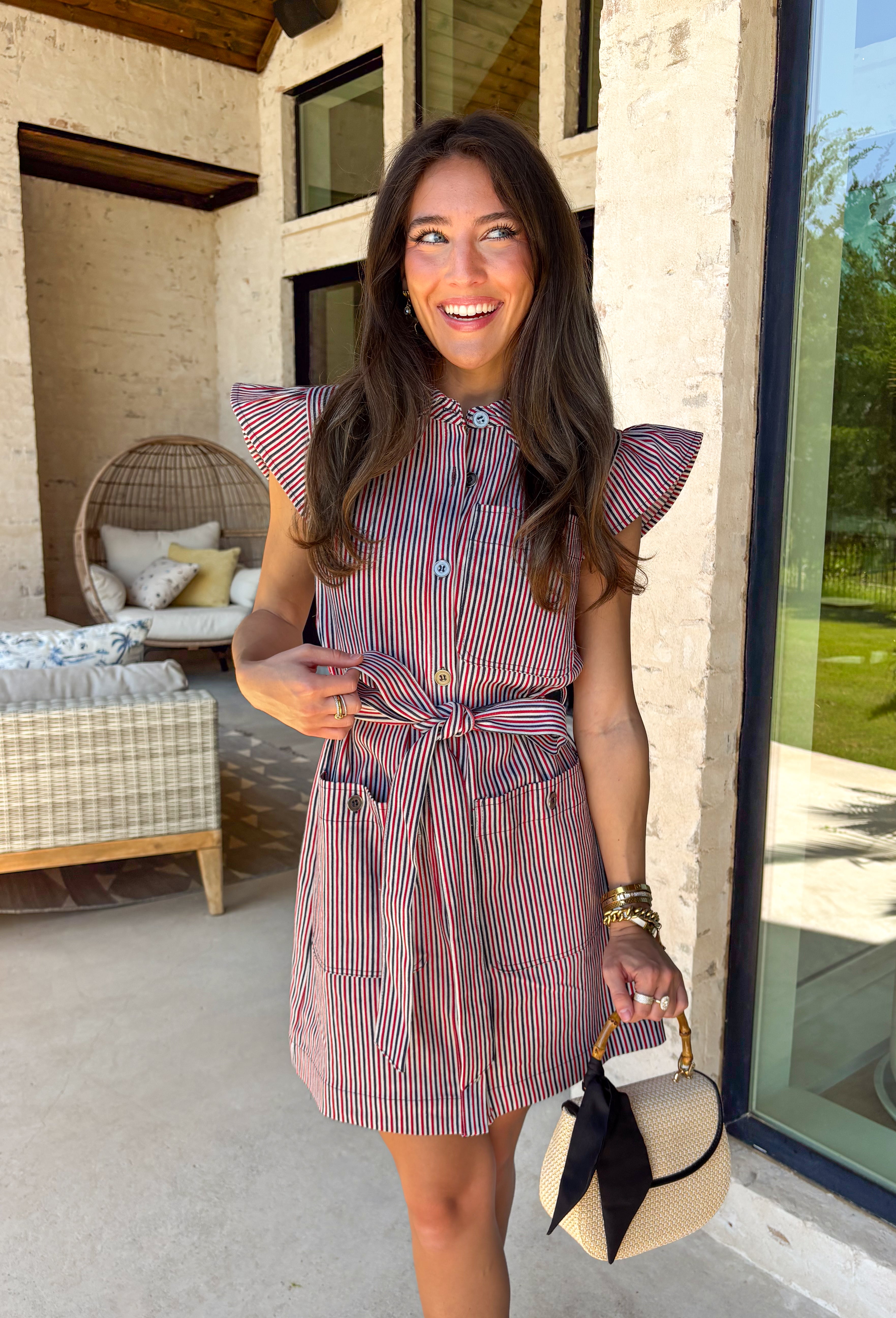 Classic with a patriotic twist! This red, white, and navy stripe button down dress is the perfect blend of timeless and fun. The crisp stripe pattern paired with a collared neckline gives it that polished shirt dress feel, while still being easy and wearable for everyday. Designed with a matching self-tie belt to cinch the waist, this dress creates a flattering silhouette you can adjust to your liking. Front pockets add a practical touch, and the lightweight fabric keeps it comfortable all day long. 