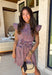 Classic with a patriotic twist! This red, white, and navy stripe button down dress is the perfect blend of timeless and fun. The crisp stripe pattern paired with a collared neckline gives it that polished shirt dress feel, while still being easy and wearable for everyday. Designed with a matching self-tie belt to cinch the waist, this dress creates a flattering silhouette you can adjust to your liking. Front pockets add a practical touch, and the lightweight fabric keeps it comfortable all day long. 