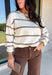 Wrap yourself in cozy comfort with this timeless sweater from Hyfve. Designed in a soft oatmeal knit, this effortlessly stylish sweater features a vintage-inspired stripe pattern in warm shades of tan and brown for the perfect touch of seasonal charm. The relaxed silhouette and soft knit make it an easy piece to throw on for crisp fall days, while the classic design ensures you'll wear it year after year. 
