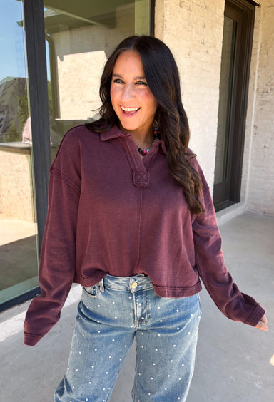 Elevate your everyday wardrobe with this effortlessly stylish top from Double Zero. Designed in a rich dark cherry hue, this versatile piece features a classic collared neckline that adds a polished touch to its relaxed silhouette. Exposed seam detailing gives it a modern, lived-in look, while the soft 100% cotton fabric keeps it comfortable enough for all-day wear. Whether you're headed to work, running errands, or meeting friends for coffee, this timeless top is an easy favorite for the season.