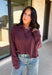 Elevate your everyday wardrobe with this effortlessly stylish top from Double Zero. Designed in a rich dark cherry hue, this versatile piece features a classic collared neckline that adds a polished touch to its relaxed silhouette. Exposed seam detailing gives it a modern, lived-in look, while the soft 100% cotton fabric keeps it comfortable enough for all-day wear. Whether you're headed to work, running errands, or meeting friends for coffee, this timeless top is an easy favorite for the season.