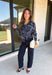 Add a touch of western-inspired charm to your fall wardrobe with this beautifully detailed cardigan from Sunday Edition. Designed in a soft dusty blue knit, this cozy button-down sweater features a vintage-inspired bandana print with cream and black floral and western detailing for a look that's both timeless and unique. Ribbed trim along the neckline, cuffs, and hem creates a polished finish, while the soft knit blend makes it the perfect layering piece for crisp autumn days.